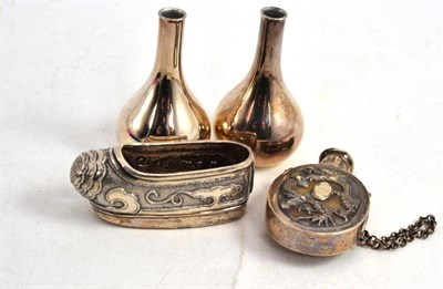 Lot 518 - A Chinese export silver shoe, a Chinese export silver scent bottle and two Dansk Designs vases