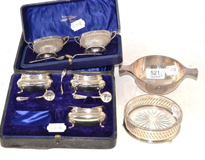 Lot 521 - A cased pair of silver salts and spoons, a cased set of three silver salts and spoons, a silver two