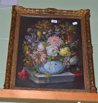 Lot 556 - * Reynold (20th Century), A still life of roses, iris and tulips in a vase on a stone ledge,...