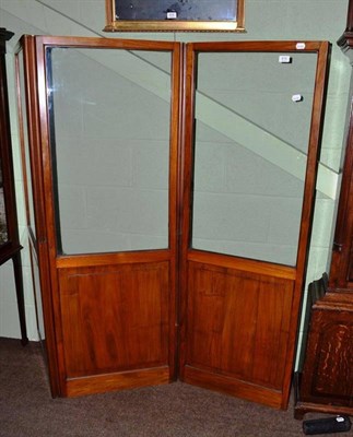 Lot 615 - Walnut and glazed three fold screen