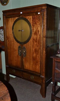 Lot 620 - Chinese two door side cabinet with brass mounted doors