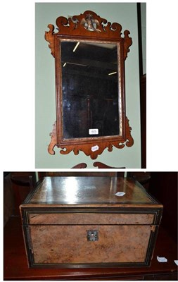 Lot 625 - A Georgian walnut fret carved wall mirror and a Victorian walnut work box (2)