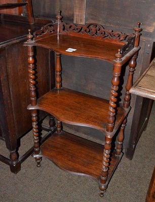 Lot 631 - Victorian rosewood three tier whatnot