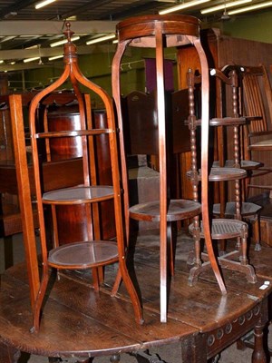 Lot 634 - A mahogany torchere and three cake stands