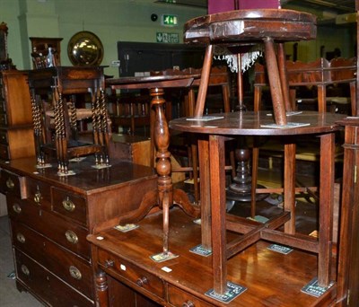 Lot 646 - An elm low circular table, a small tripod table, an oak circular table and an oak nest of three...