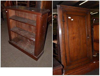 Lot 651 - A 19th century oak straight front corner cupboard and an oak open bookcase