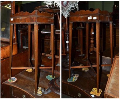 Lot 655 - A pair of mahogany kettle stands