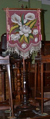 Lot 656 - Victorian rosewood pole screen with beadwork banner