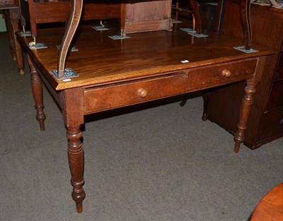 Lot 660 - Late Victorian writing table fitted with two drawers