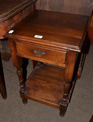 Lot 664 - Reproduction oak bedside table fitted with one drawer