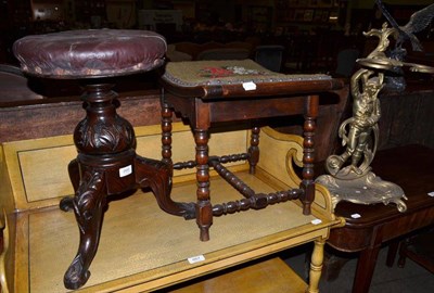 Lot 666 - A Victorian revolving piano stool, brass stick stand and an oak bobbin turned stool