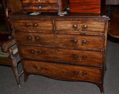 Lot 674 - A George III mahogany four height chest of drawers