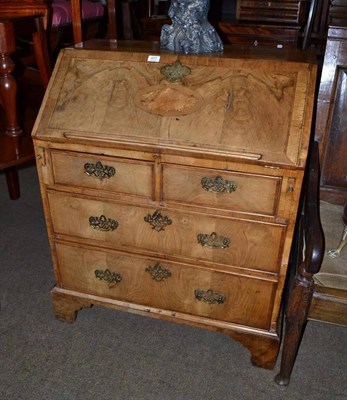 Lot 677 - Georgian small walnut bureau inlaid with shell pattern