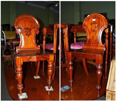 Lot 678 - A pair of Victorian mahogany hall chairs