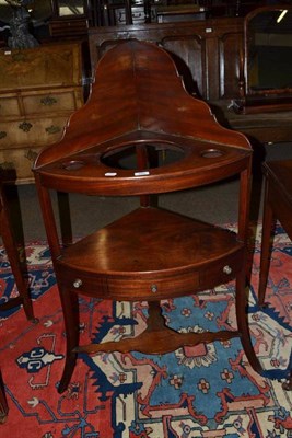 Lot 683 - George III mahogany corner washstand