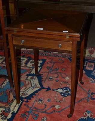 Lot 684 - Edwardian mahogany envelope card table