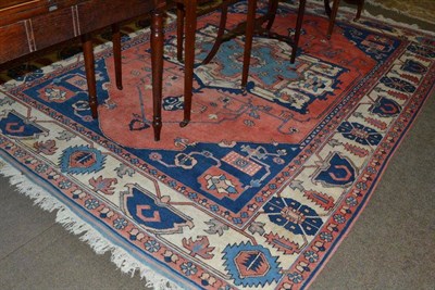 Lot 686 - Anatolian carpet of Heriz design, the lozenge field with typical medallion framed by ivory borders