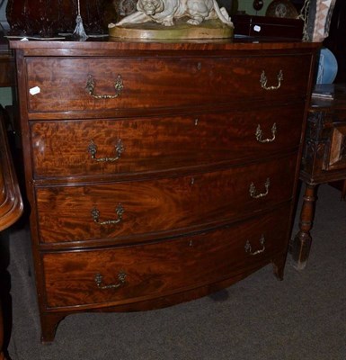 Lot 694 - A late George II mahogany bow front four height chest