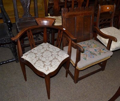 Lot 704 - An 18th century oak open armchair with panel back and needlework seat - cut down, an Edwardian...