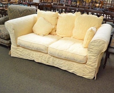 Lot 712 - Two seater yellow sofa