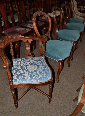 Lot 717 - A set of four Victorian walnut balloon back chairs and a beech corner chair