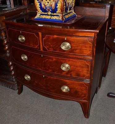 Lot 736 - A late George III mahogany small bow front chest