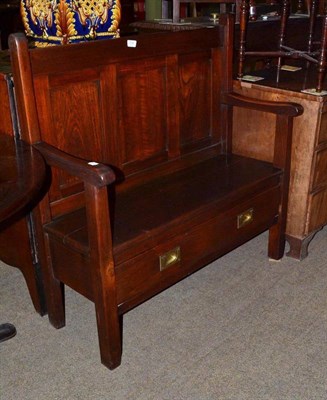 Lot 739 - A small walnut settle with frieze drawer