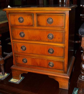 Lot 744 - Reproduction burr yew miniature five drawer chest