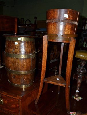 Lot 749 - An oak coopered plant stand and a barrel (2)