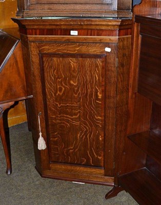 Lot 776 - A 19th century oak straight front corner cupboard with mahogany veneered frieze