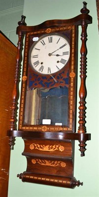 Lot 777 - An Ansonia wall clock in an inlaid rosewood case