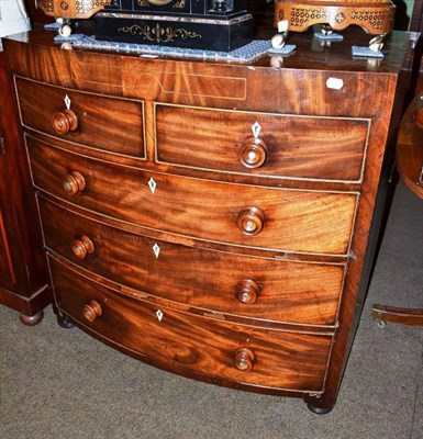 Lot 792 - An early Victorian mahogany four height bow front chest