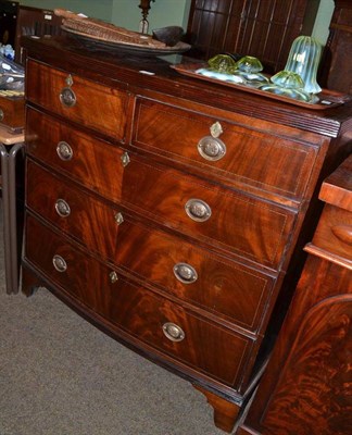 Lot 794 - An early 19th century mahogany bow front chest with reeded edge