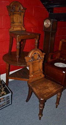 Lot 824 - Oak cricket table and a pair of Victorian oak hall chairs