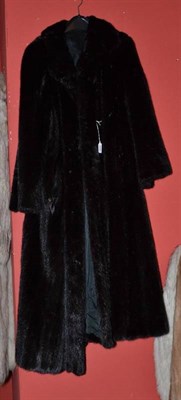 Lot 836 - Dark mink full length fur coat with shawl collar and bracelet sleeves