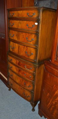 Lot 850 - Reproduction walnut chest on chest