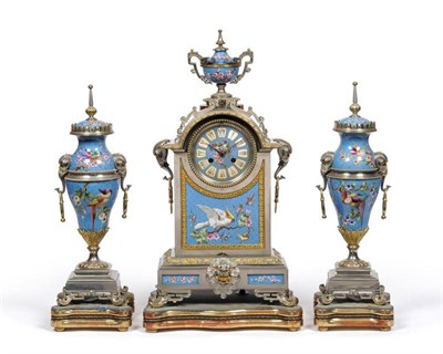 Lot 898 - An Impressive French Silvered and Porcelain Mounted Striking Mantel Clock with Garniture, circa...