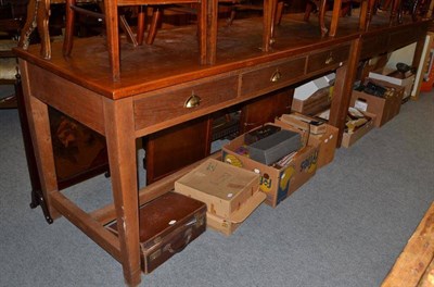 Lot 864 - Two large side tables fitted with three drawers