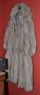 Lot 877 - Full length white fox fur coat with grey leather trims