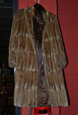 Lot 885 - A full length fur coat and a mink stole