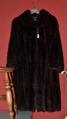 Lot 900 - Dark fur coat, three quarter length