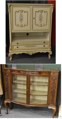 Lot 933 - An Italian floral painted television cabinet and a glass front display cabinet