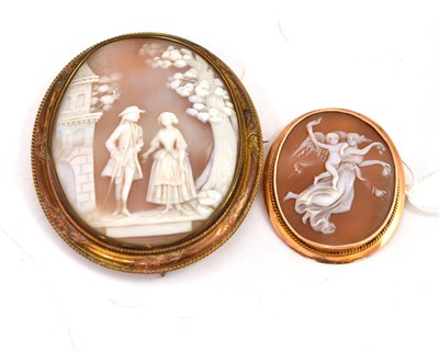 Lot 6 - A cameo brooch of a pastoral scene, and a cameo brooch with a winged figure