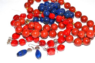 Lot 8 - Lapis lazuli beaded necklace and drop earrings, and two coral coloured beaded necklaces and pair of