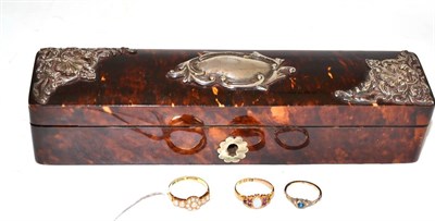 Lot 11 - An 18ct gold pearl set ring, an 18ct gold opal and garnet set ring and another ring, in a...