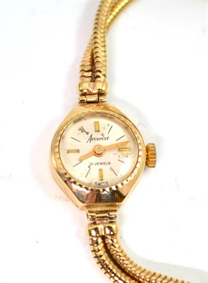 Lot 13 - A lady's 9ct gold Accurist wristwatch with snake link bracelet