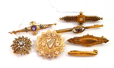 Lot 20 - A seed pearl set star brooch stamped '15ct', a 9ct gold brooch and five late Victorian and...