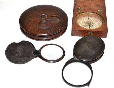 Lot 40 - Travel compass, oak circular box and two eye glasses