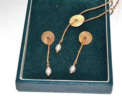 Lot 48 - A 9ct gold necklace and earring set, by Ola Gorie, a textured disc to beaded chain, with a...