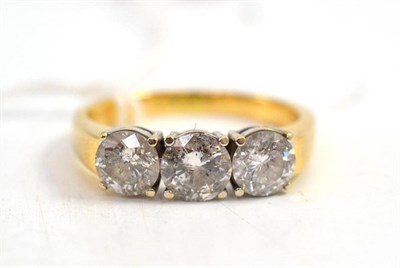 Lot 60 - An 18ct gold diamond three stone ring, total estimated diamond weight 2.00 carat approximately